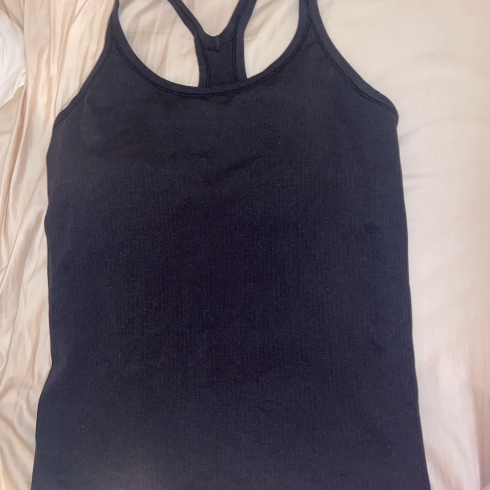 Lululemon ebb to street black tank top size: 8/10